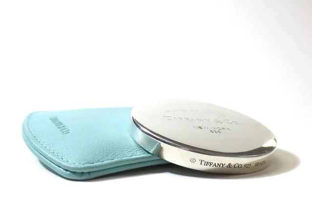 tiffany, tiffany co, luxury, blue, baby blue, tiffany blue, mirror, sterling, sterling silver, engraved, return, gift, designer, authentic, package, present, turquoise, design, celebration, surprise, color, happy, girl, ladies, lady, women, classic, classy, pretty, face, reflection, spain, pocket, leather, shiny, metal, round, macro, happy birthday, fine, rich, expensive, anniversary, celebrate, white, new york, new, york, silver, financial planning, self love, beauty, fashion. Silver guide: US hallmarking and FTC silver stamping rules