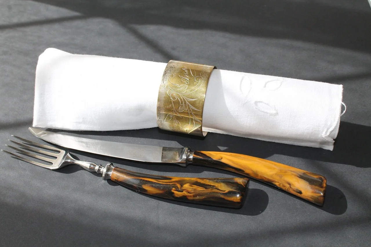 cutlery, table setting, sterling silver, napkin, white, knife, fork, display, gray table. Sterling Silver Hallmarks and Craft: How to Tell Sterling From Silver Plate