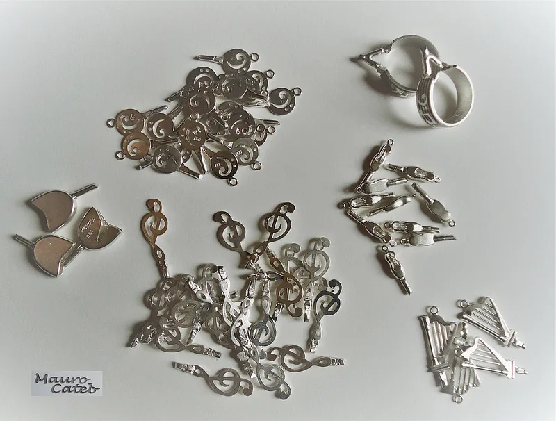 Cast jewelry components described by their maker as 950 silver